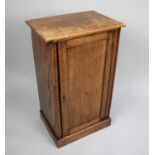 An Edwardian Oak Shelved Bedside Cabinet with Panelled Door, 45cms Wide