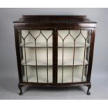 A Mid 20th Century Bow Fronted Oak Galleried Two Shelf Display Cabinet, 122cms Wide, Claw and Ball