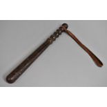 An Early/Mid 20th Century Turned Wooden Truncheon with Leather Strap, 39cms Long