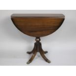 A Modern Mahogany Drop Leaf Circular Coffee Table on Four Scrolled Supports on Claw Feet, 29cms Wide