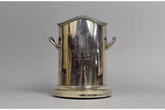 A Mid 20th Century Silver Plated Bottle Coaster with Two Handles, 17cms High - Image 1 of 3