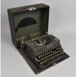 A Vintage Portable Typewriter (Worn Condition)