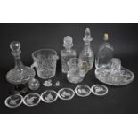 A Collection of Various Glasswares to include Cut Glass Ice Bucket, Ships and Other Decanters Etc