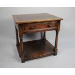 A Mid 20th century Oak Occasional Side Table with Single Long Drawer, Stretcher Shelf and Turned