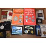 A Collection of Various Military Books, Spitfire, Pocket Watch Set, Etc