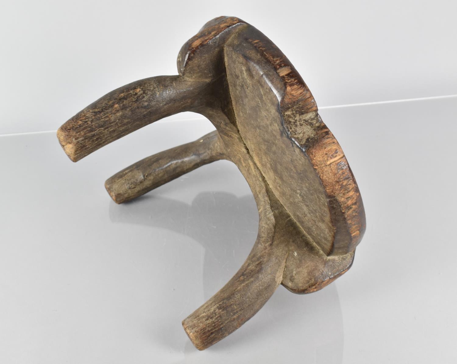 A Late 19th Century African Carved Wood He-He Stool from Tanzania, with a Well Patinated Dished - Image 6 of 7