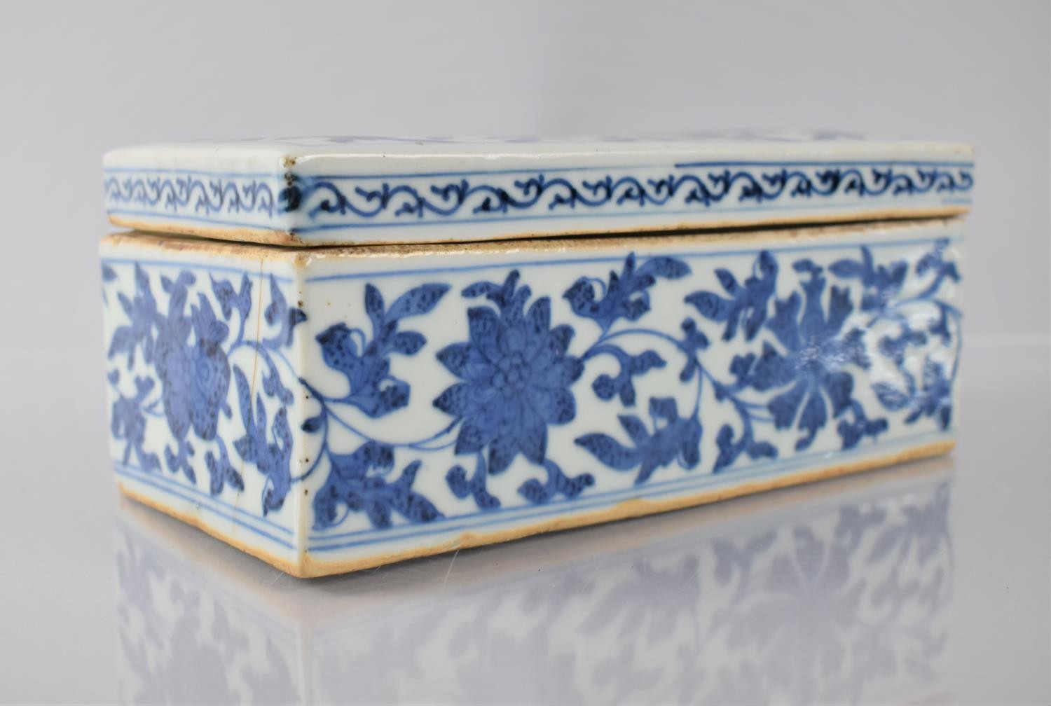 A Chinese Porcelain Blue and White Pen Box and Cover of Rectangular Form, 18.5x9.5x7.5cms High