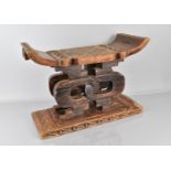 An Early 20th Century African Carved Wood Ashanti Stool, from Ghana with Typical Chip Carved