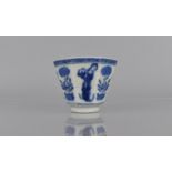 An Oriental Porcelain Blue and White Tea Bowl of Hexagonal Form decorated with Maidens and Planters,