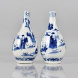 A Pair of 19th Century Chinese Blue and White Bottle Vases decorated with Dignitaries and Figures in