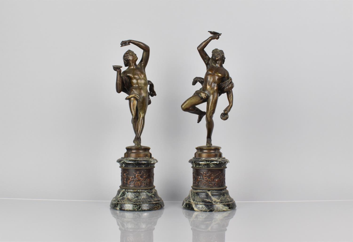 A Pair of 19th Century French Bronze Figural Garnitures, Classical Nude Playing Cymbal and the Other