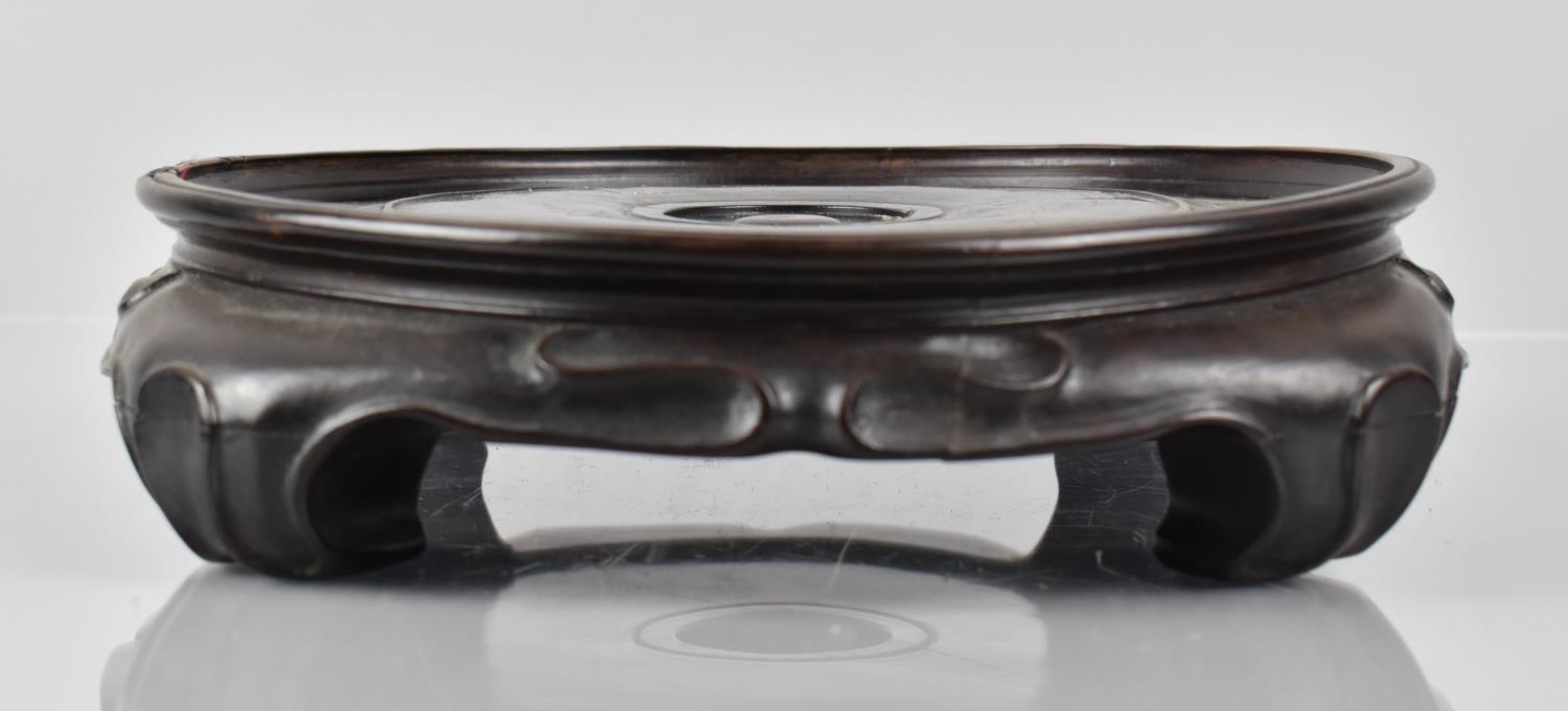 A Large 19th Century Chinese Hardwood Carved and Moulded Vase Stand Supported on Four Short Scrolled - Image 2 of 4