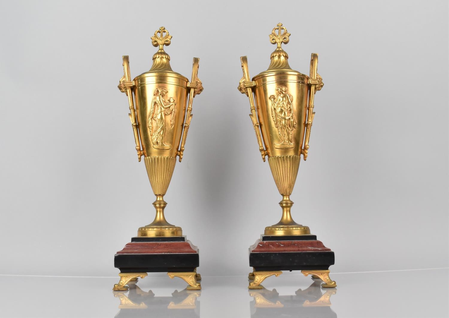 A Pair of French 19th Century Gilt Bronze Garnitures in the Form of Two Handled Lidded Vases