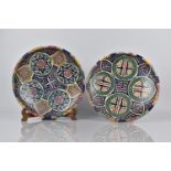 Two North African Pottery Chargers decorated in Polychrome Enamels in the Islamic style with