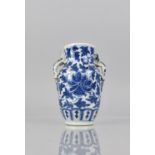 An 18th/19th Century Chinese Blue and White Vase decorated with Central Flower and Foliage, The Neck