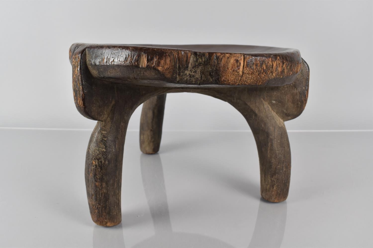 A Late 19th Century African Carved Wood He-He Stool from Tanzania, with a Well Patinated Dished - Image 2 of 7