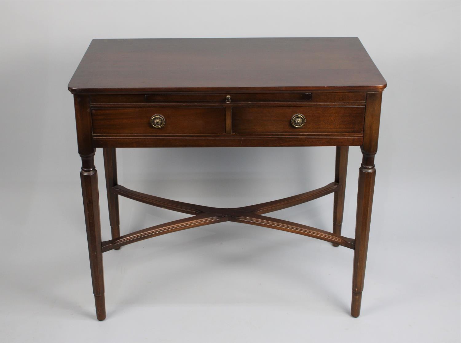 A Late 20th Century Mahogany Two Drawer Side Table on Turned Supports with X Stretchers, 83cms Wide