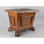 An Early 20th Century Arts and Crafts Style Oak Box of Sarcophagus Shape, Top with Carved Oak Leaves