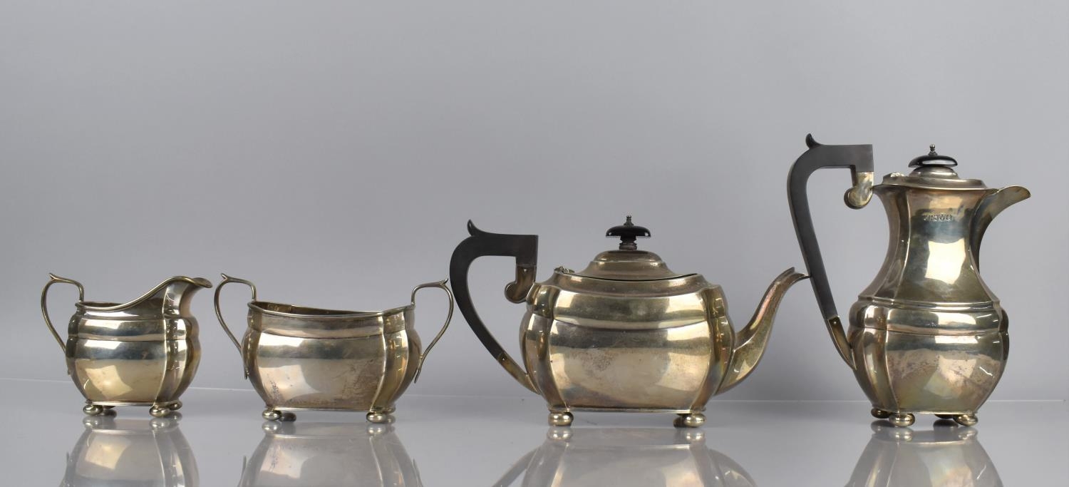 A George V Four Piece Silver Tea Service by S Blackensee and Son, The Teapot, Milk Jug and Sugar