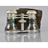A Cased Pair of Enamel and Mother of Pearl EB Meyrowitz Opera Glasses Finely decorated with Dandy