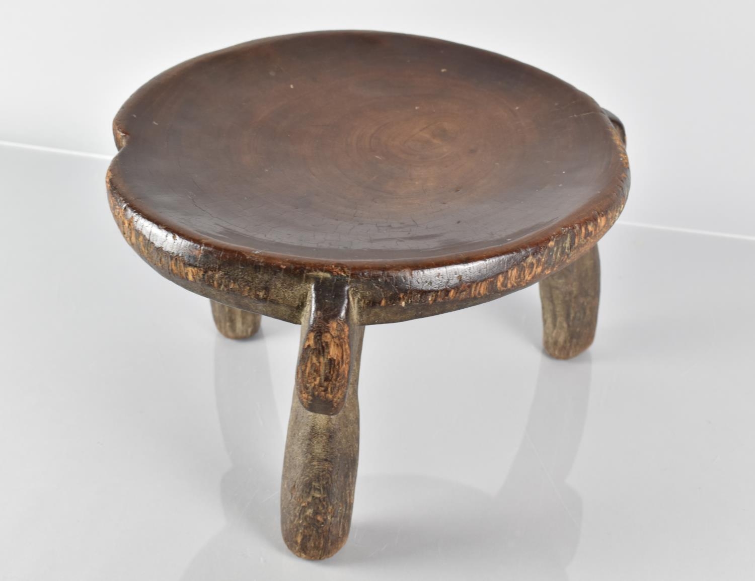 A Late 19th Century African Carved Wood He-He Stool from Tanzania, with a Well Patinated Dished - Image 5 of 7