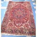 A Large Antique Persian Heriz Rug on Red Ground, Some Wear and Condition Issues, 340x240cms