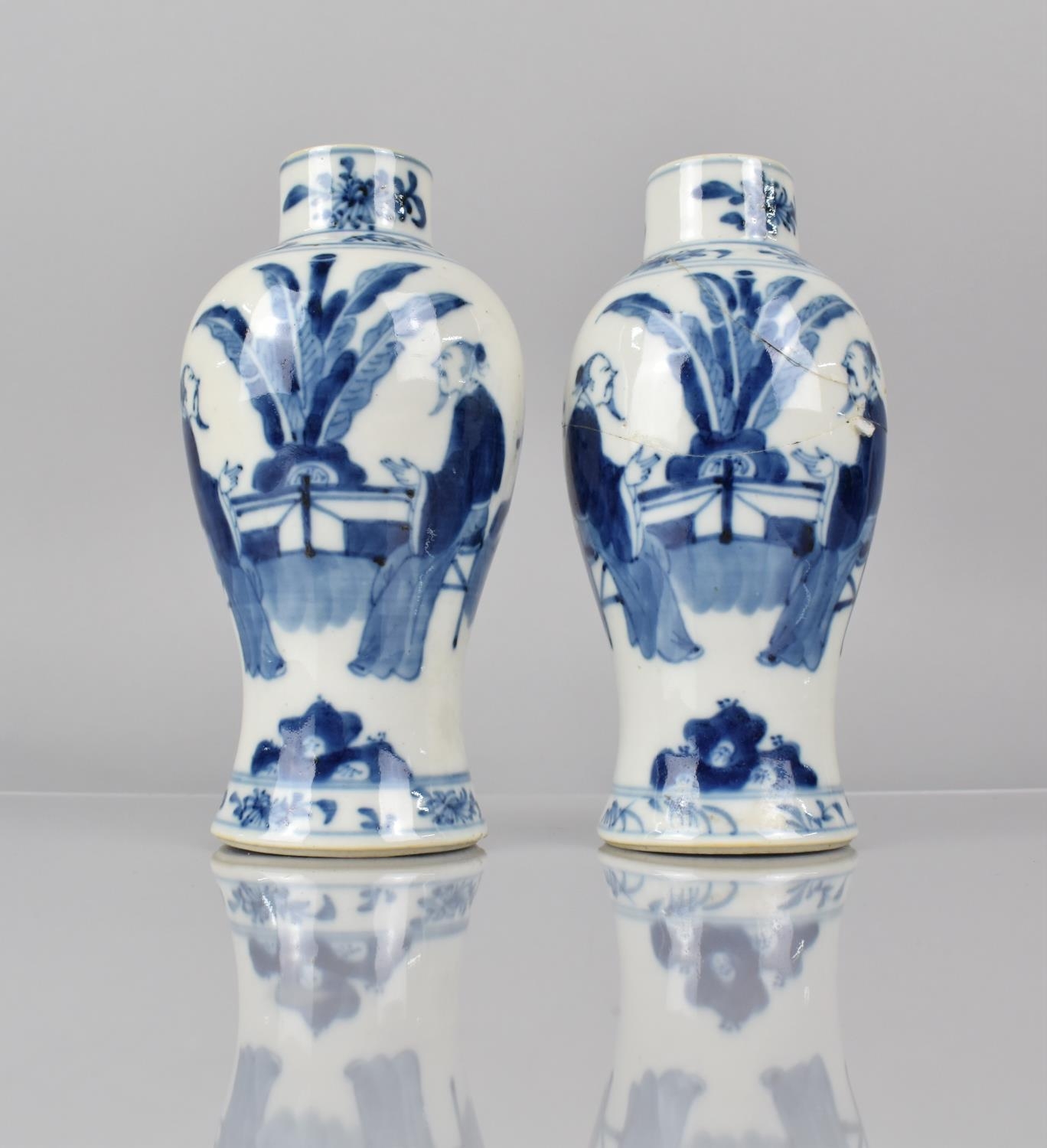 A Pair of 19th Century Chinese Porcelain Blue and White Vases decorated with Scholars in Garden