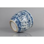 A Chinese Blue and White Planter decorated with Birds in Blossoming Branches, Prunus Band Trim, 20.