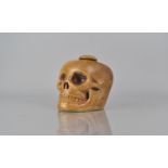 A Late 19th/Early 20th Century Painted Plaster and Wood Tobacco Jar Modelled as a Human Skull,