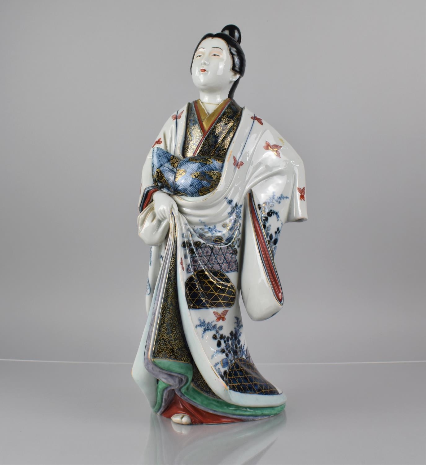 A 19th Century Japanese Porcelain Study of Maiden in Robe Decorated in the Imari Palette with Gilt