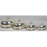 A Set of Four Edwardian Graduated Silver Plated Meat Covers, Largest 50cms Long, Smallest 30cms Long