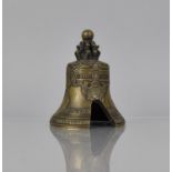 A Cast Bronze Replica of The Tzar Bell, Missing Finial, 13cms High
