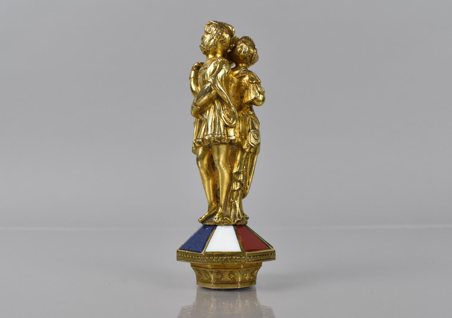 A 19th Century Gilt Metal Seal formed as Three Romantic Figures in an Embrace on Octagonal Base - Image 4 of 7