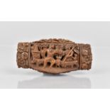 An 18th/19th Century Carved Coquilla Nut Snuff carved with Farmer and Wife, Sheep and Flowers,