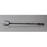 A 18th/19th Century Wrought Iron Triple Tined Lark Braising Fork, 44cms Long