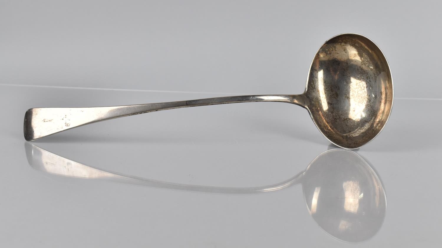 A Georgian Silver Ladle, Hallmark Rubbed, 33cms Long, 193gms