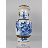 A Large Chinese Blue and White Crackle Glazed Vase Decorated with Birds in Blossoming Branches,