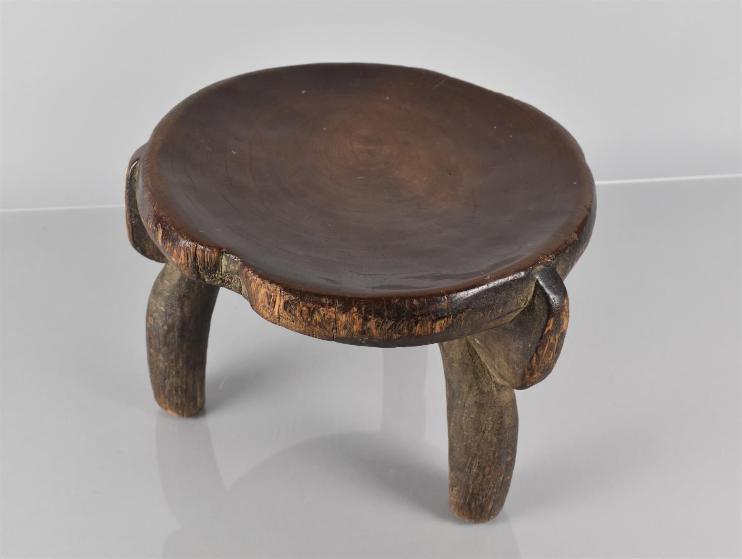 A Late 19th Century African Carved Wood He-He Stool from Tanzania, with a Well Patinated Dished - Image 3 of 7