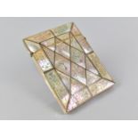 A 19th Century Mother of Pearl Card Case with Engraved Decoration, 11x8cms