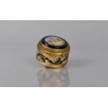 A Small 19th Century Gilt Metal and Enamel Grand Tour Box of Circular Form, The Hinged Lid with
