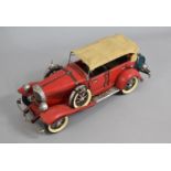 A Modern Reproduction Tinplate Model of a Vintage Car, 34cms Long