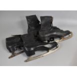 Two pairs of Vintage Ice Skates