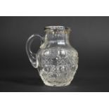 A Silver Rimmed and Cut Glass Noggin Jug, Hallmark for Robert Pringle & Sons, London, 9cm high