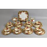 An Early 20th Century Rose and Gilt Tea Set to comprise Eight Cups and Saucers, Nine Side Plates,
