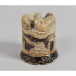 A Chinese Soapstone Ink Pot and Cover, the Cover with Carved Decoration Depicting Nesting Squirrels,