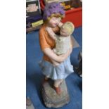 A Repainted Reconstituted Stone Garden Ornament, Mother and Child, 56cms High