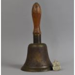 A WWII ARP Hand Bell and Badge