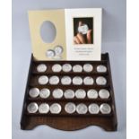 A Limited Edition Set of 26 Silver Miniature Plates, Floral Alphabet, with Display Stand and Leaflet
