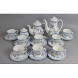 A Royal Doulton Service to comprise Eight Cups, Teapots, Lidded Sugar Pot, Saucers Etc