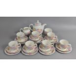 A Royal Doulton Expressions Bloom Tea Set to comprise Eight Cups, Saucers and Side Plates, Teapot,